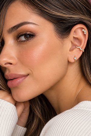 Piercing de orelha em aço cirúrgico e titânio
